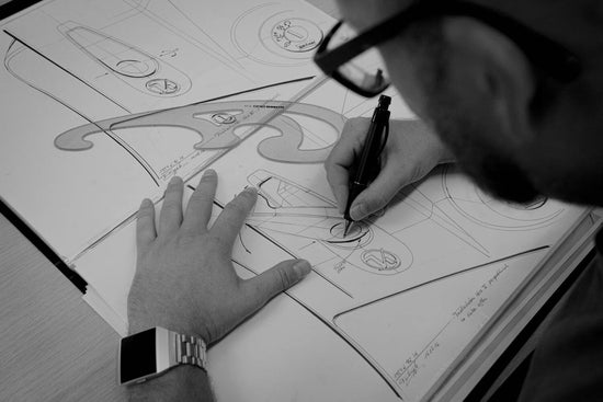 domhus designers sketching a product by hand in black & white
